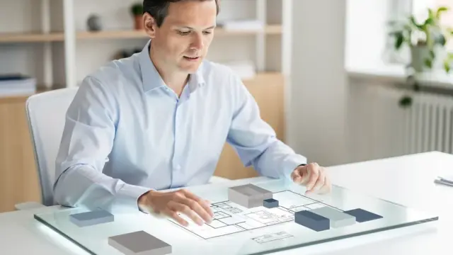 Moderne Büroarbeitsplätze mit digitaler Technik im Bauamt für effiziente Abläufe