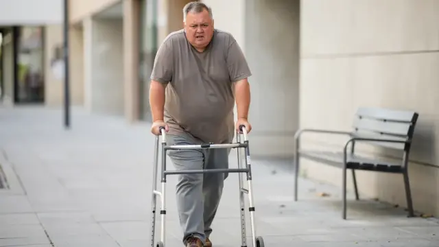 Symbol für Merkzeichen G bei schwerer Gehbehinderung durch starkes Übergewicht